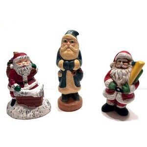 Three Santa Claus Figures Father Christmas St. Nicholas Holiday Jolly Gifts
